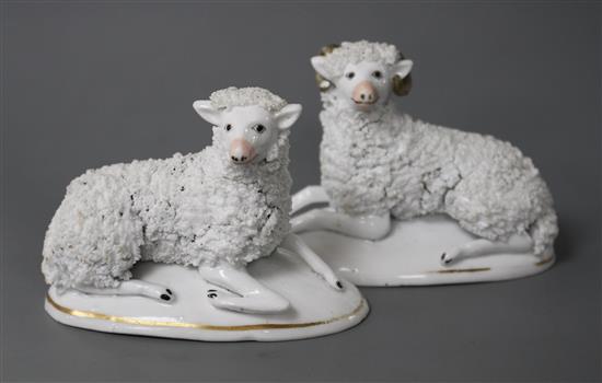 A good pair of Staffordshire porcelain figures of a recumbent ram and ewe, c.1830-50, L. 10cm